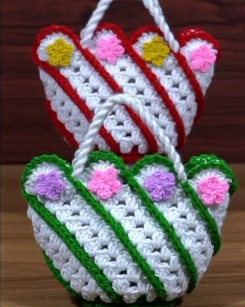 A close-up of a beautifully crocheted pumpkin decoration, showcasing texture and color perfect for autumn.