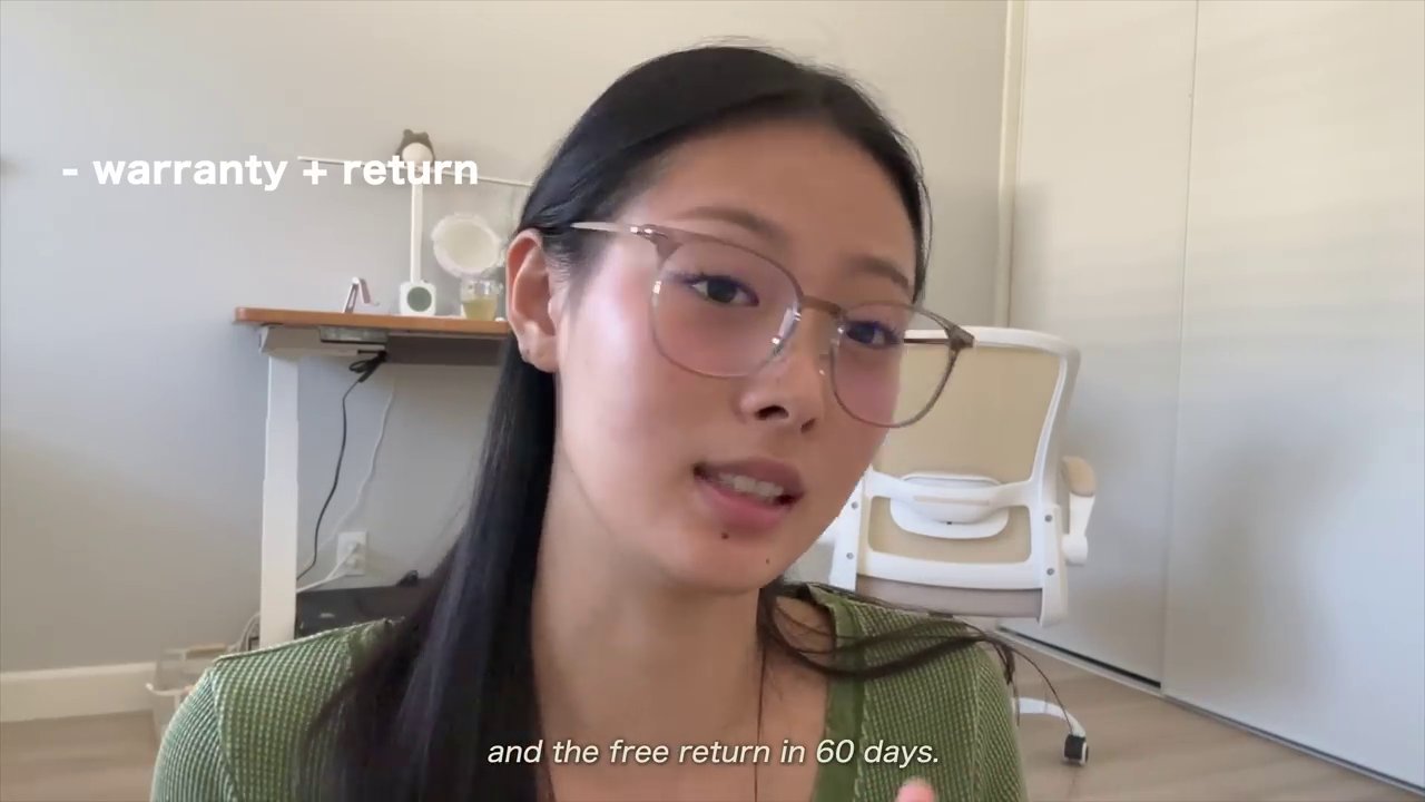 A detail shot focusing on the desk's cable management system, showing how wires are neatly tucked away.