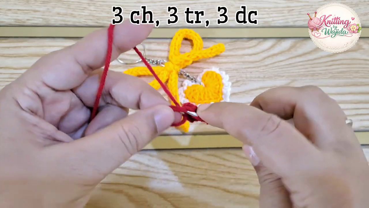 Two rounded bumps formed by the initial stitches, with the magic ring pulled tight in the center.