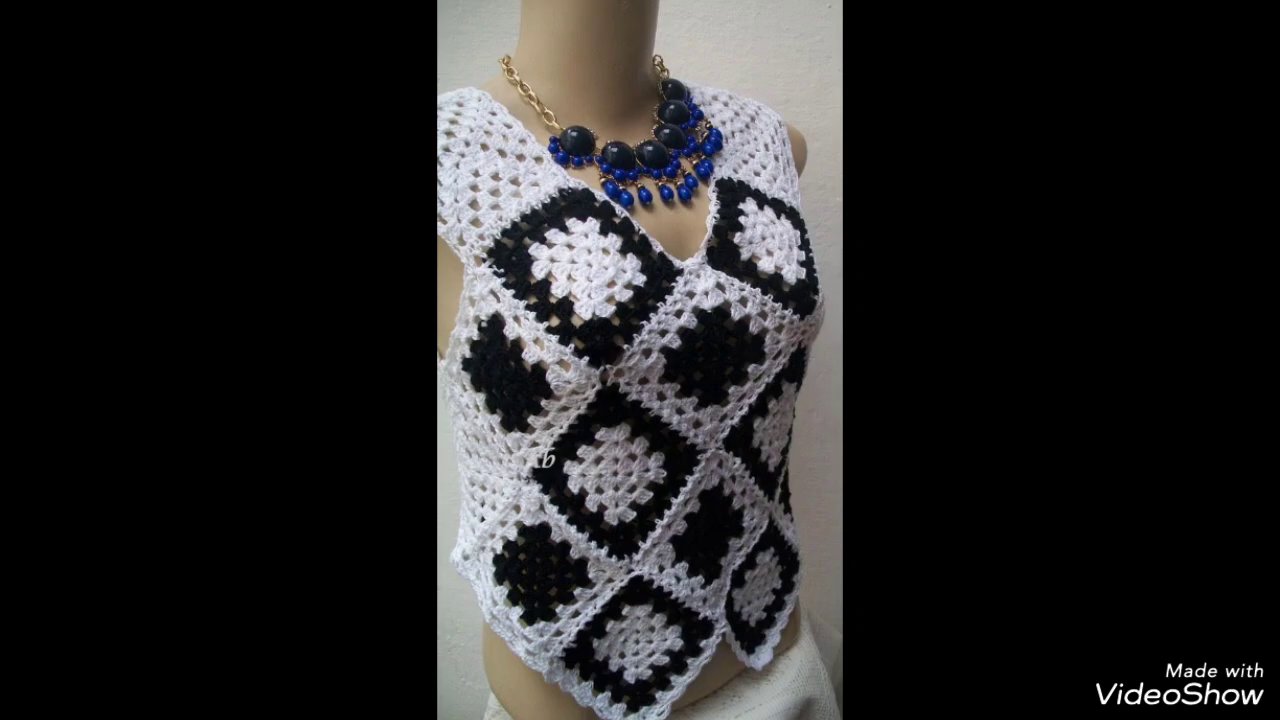 A textured crochet swatch showing bobble stitches and raised ridges.