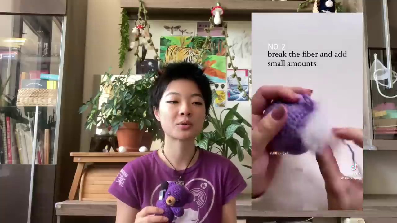 A half-stuffed crochet plushie with polyfill visible inside, showing the right amount of filling.