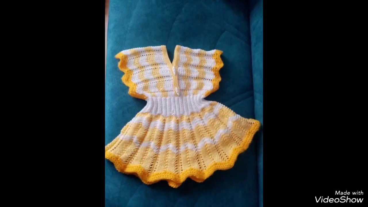 A textured crochet patron showing raised stitches and soft shadows.