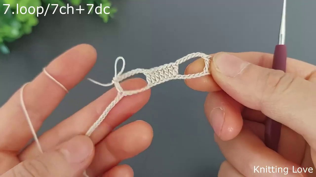 The hook working a chain of five, with the previous single double crochet visible in the center.