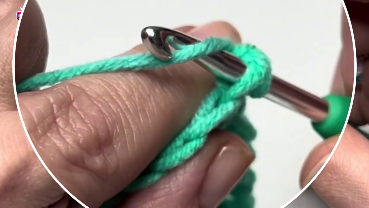 Four loops on the hook after inserting into the same stitch and pulling up an additional loop.