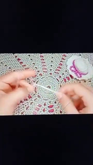 Final frame showing the crochet piece clearly, stitches uniform and well-formed.