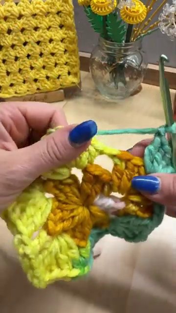 A selection of hexagon granny squares in different color combinations, showing the pattern’s versatility.