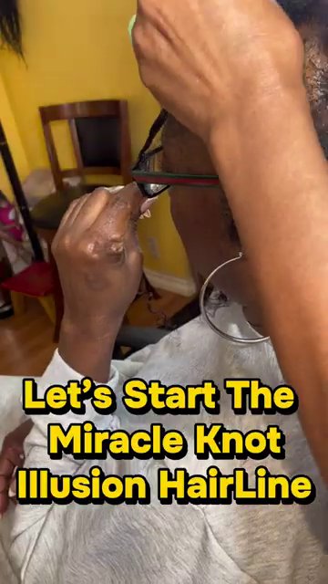 Starting a cornrow at the front, with braiding hair being fed in for thickness and security.