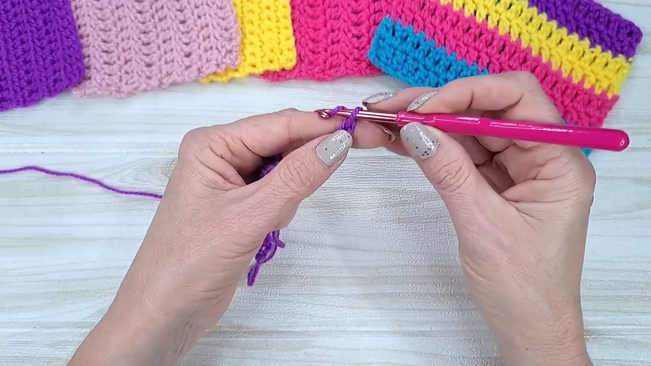 A side-by-side view of half double crochet rows showing the edge before and after using this technique.