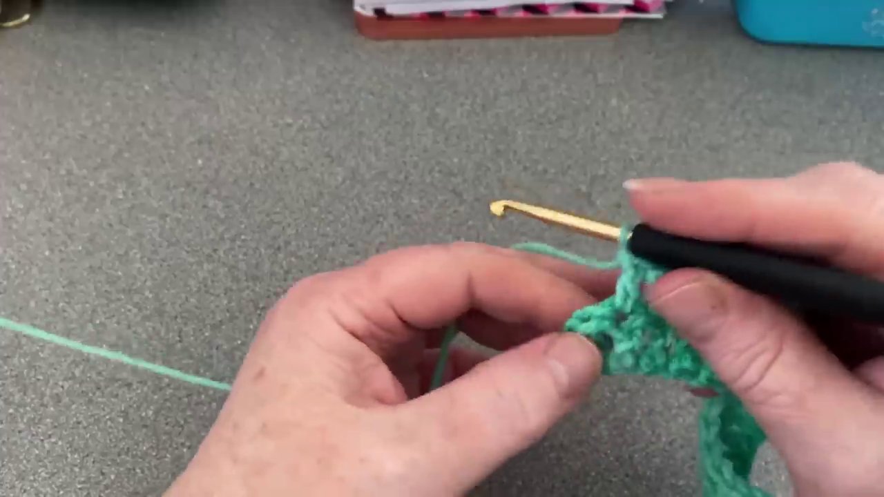 The end of a row, showing the two clear loops ready for the final stitch, with no tight turning chain in sight.