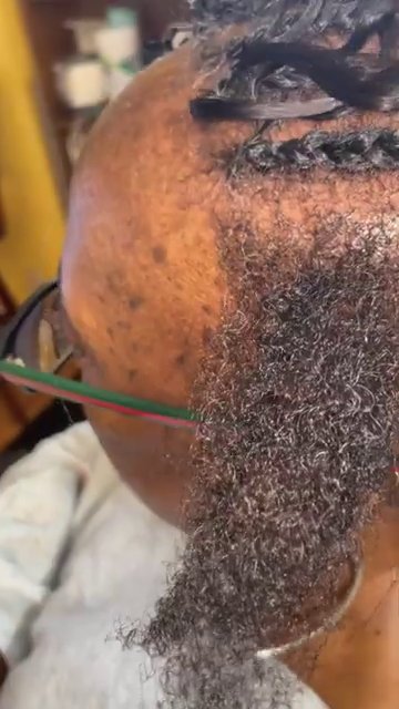 Pulling the finished style back to show the illusion hairline and no tension on edges.