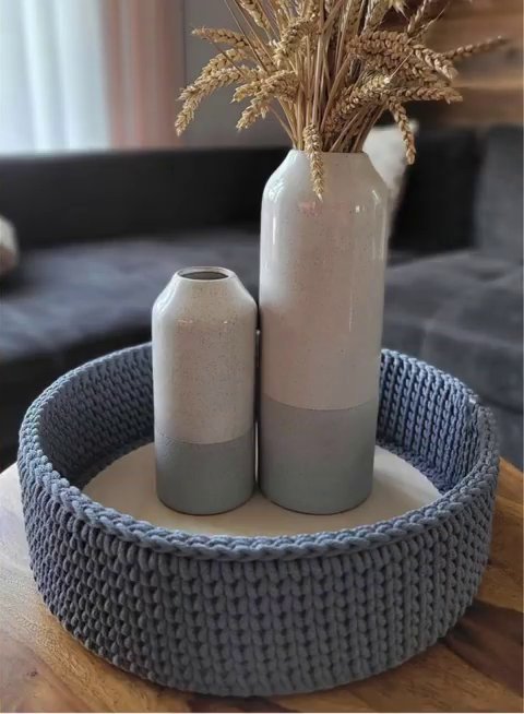 Three different yarn types side by side: a fluffy chenille, a smooth cotton, and a textured roving wool.